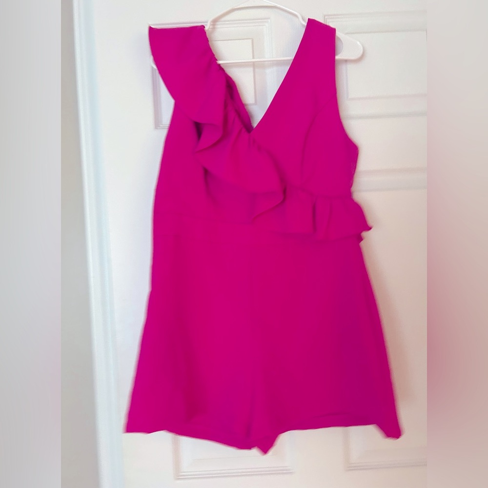 Boutique pink romper. Medium. Excellent condition.